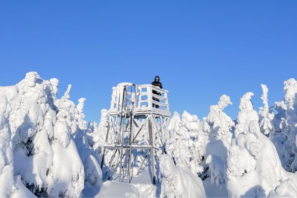 Tower on top of Coburn Mountain, snowmobiling in The Forks, Maine